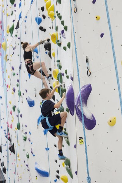 families climbing together at Velocity Climbing Miami